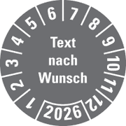 Jahresprüfplakette nach Wunsch, mit Text und Jahreszahl